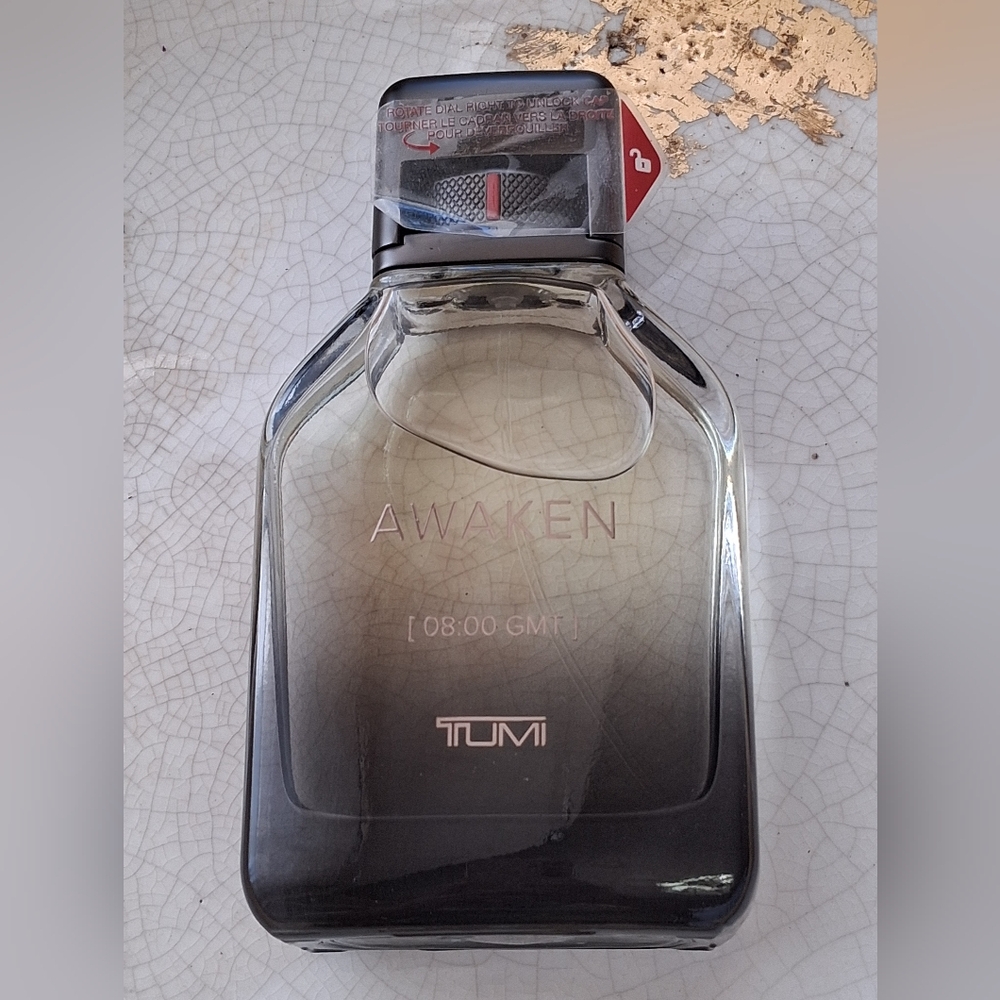 Tumi Awaken by Tumi Eau De Parfum Spray 3.5 oz